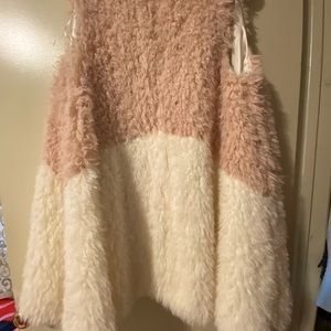 Sleeveless open front fuzzy coat